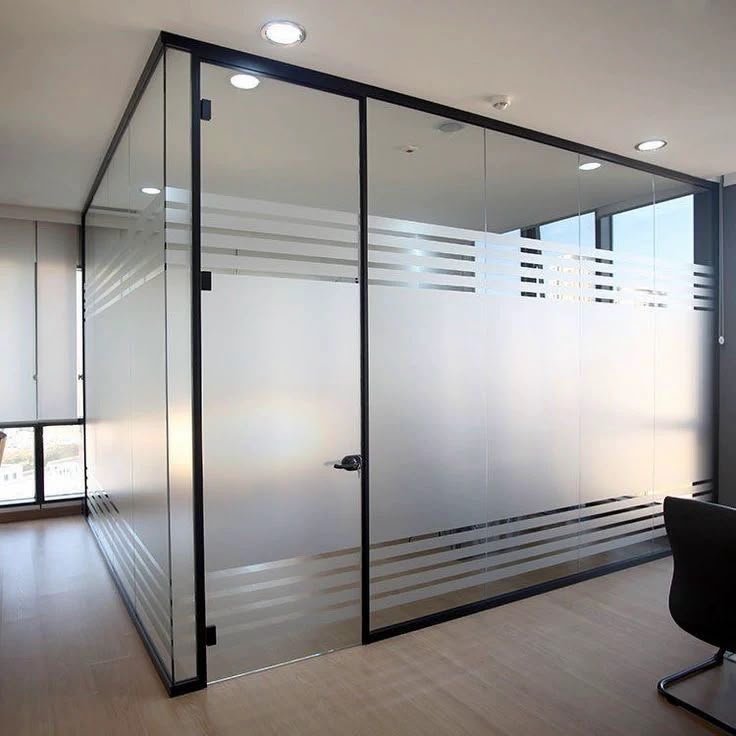 Privacy film installed on a modern glass partition