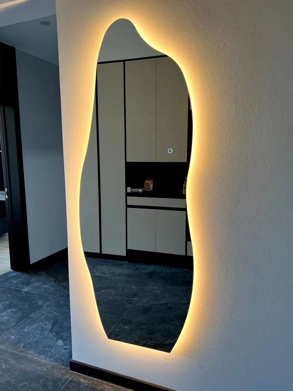 Coordinated illuminated mirrors in a commercial space