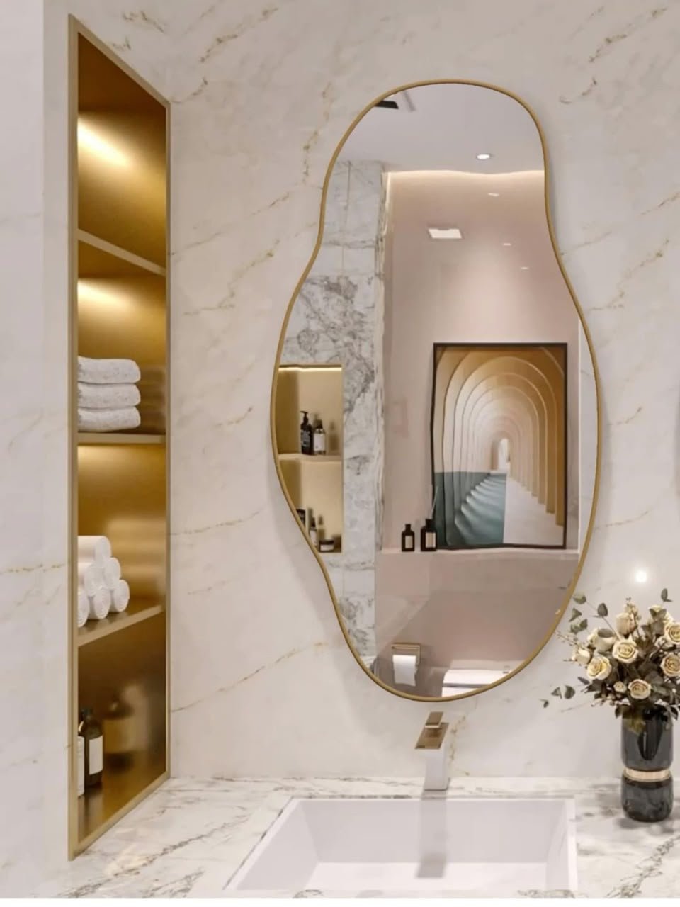 Illuminated LED glass mirror above a modern bathroom vanity